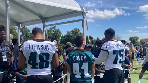 Post-practice autograph line with Patrick Johnson, Britain Covey, and Tarron Jackson